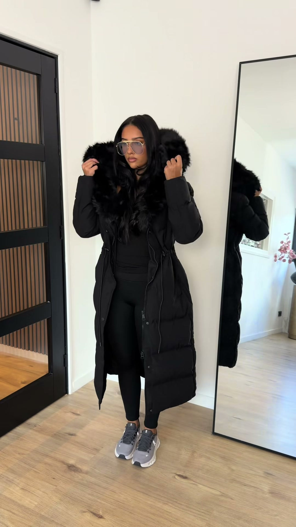 black-long-puffer-coat-faux-fur-hood-maxi-winter-coat