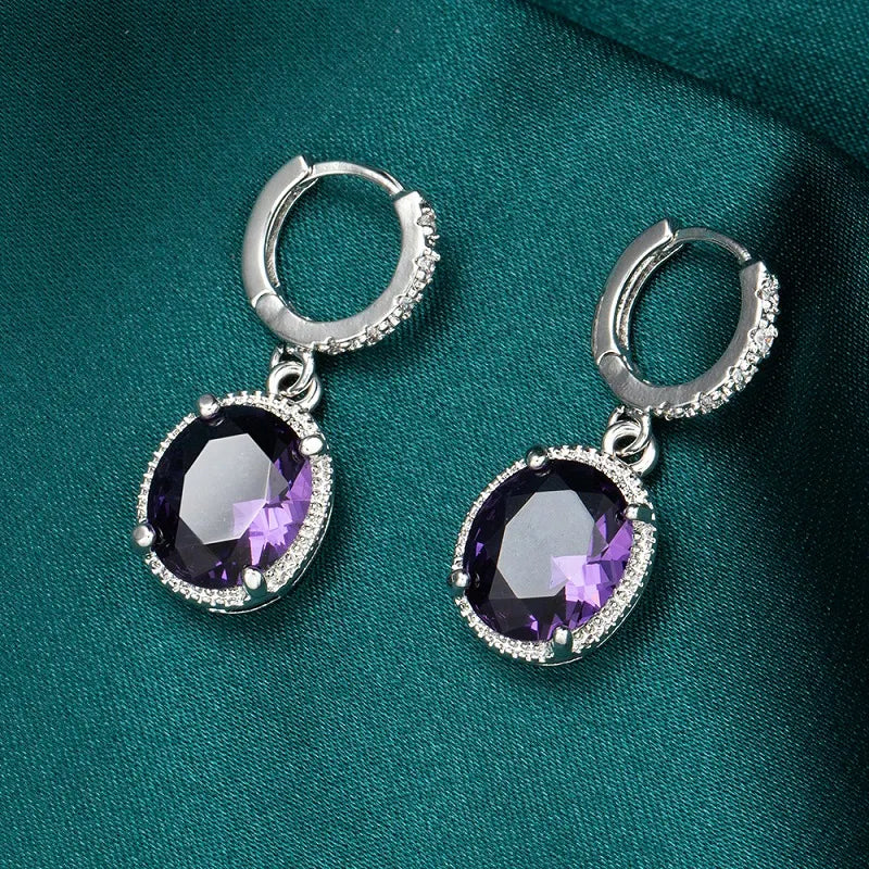 Purple red zircon round earrings