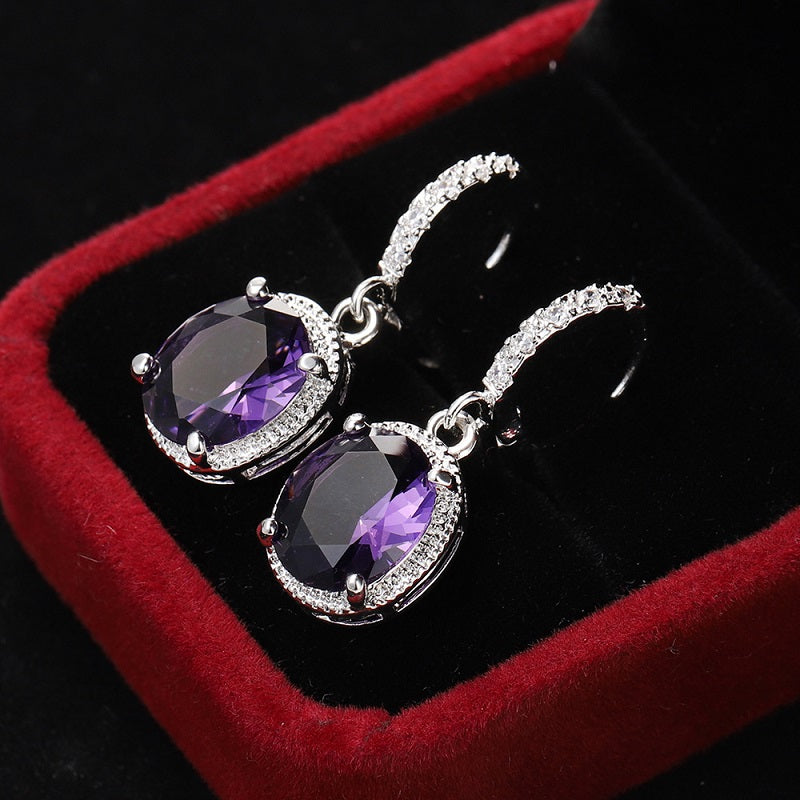 Purple red zircon round earrings