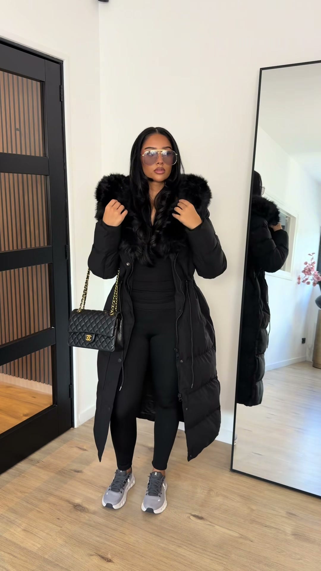black-long-puffer-coat-faux-fur-hood-maxi-winter-coat
